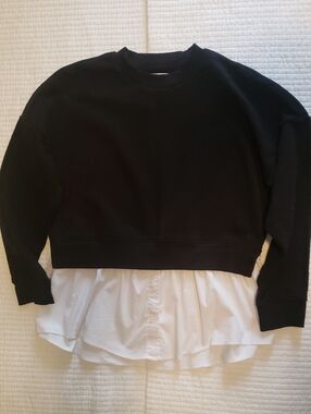 Calvin Klein Black Crewneck with White Shirt-Hem Detail